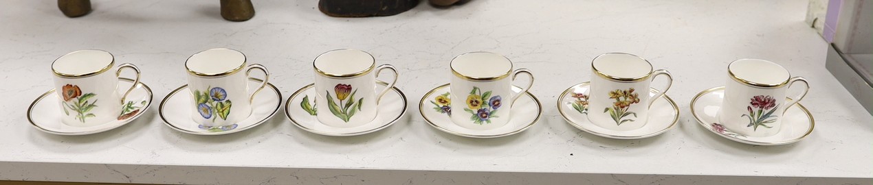 A Worcester botanical decorated coffee set.